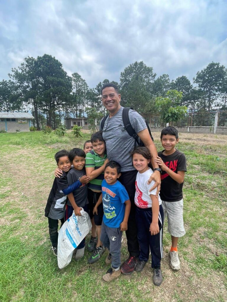 Kyle with the local children